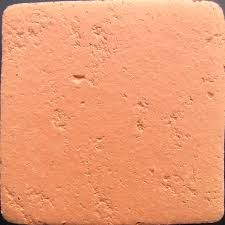 Semi hand-made natural terracotta tile with warm orange clay surface.